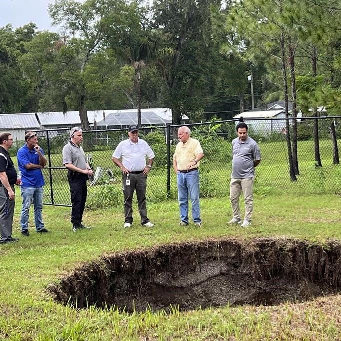 A Florida sinkhole that claimed a man's life in 2013 reopens, this time harmlessly